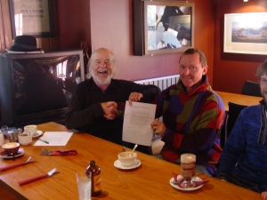 Robin Judkins signing agreement